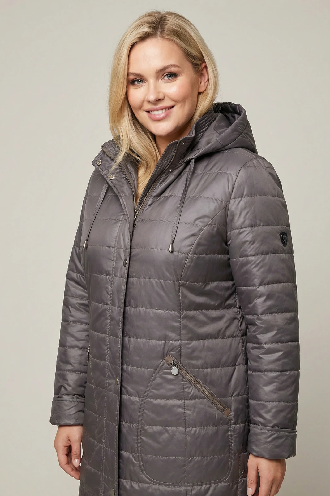 Kurtka zimowa pikowana szara z kapturem - produkcja odzieży wierzchniej